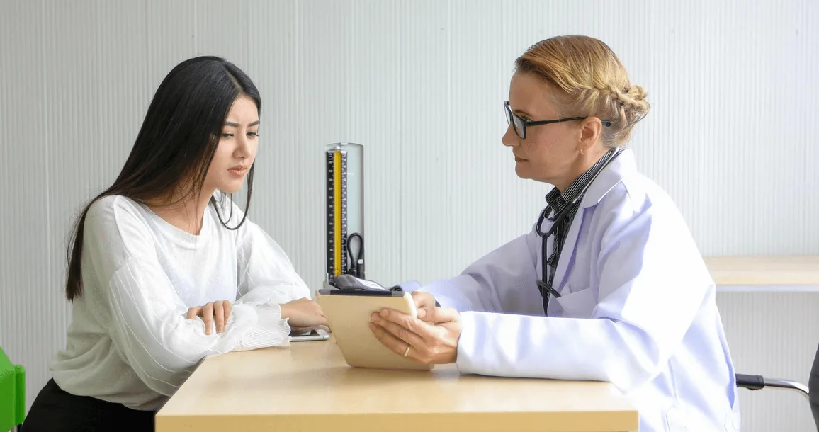Family consulting a doctor about a health package