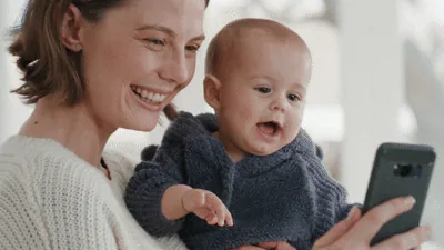Mother laughing with her baby